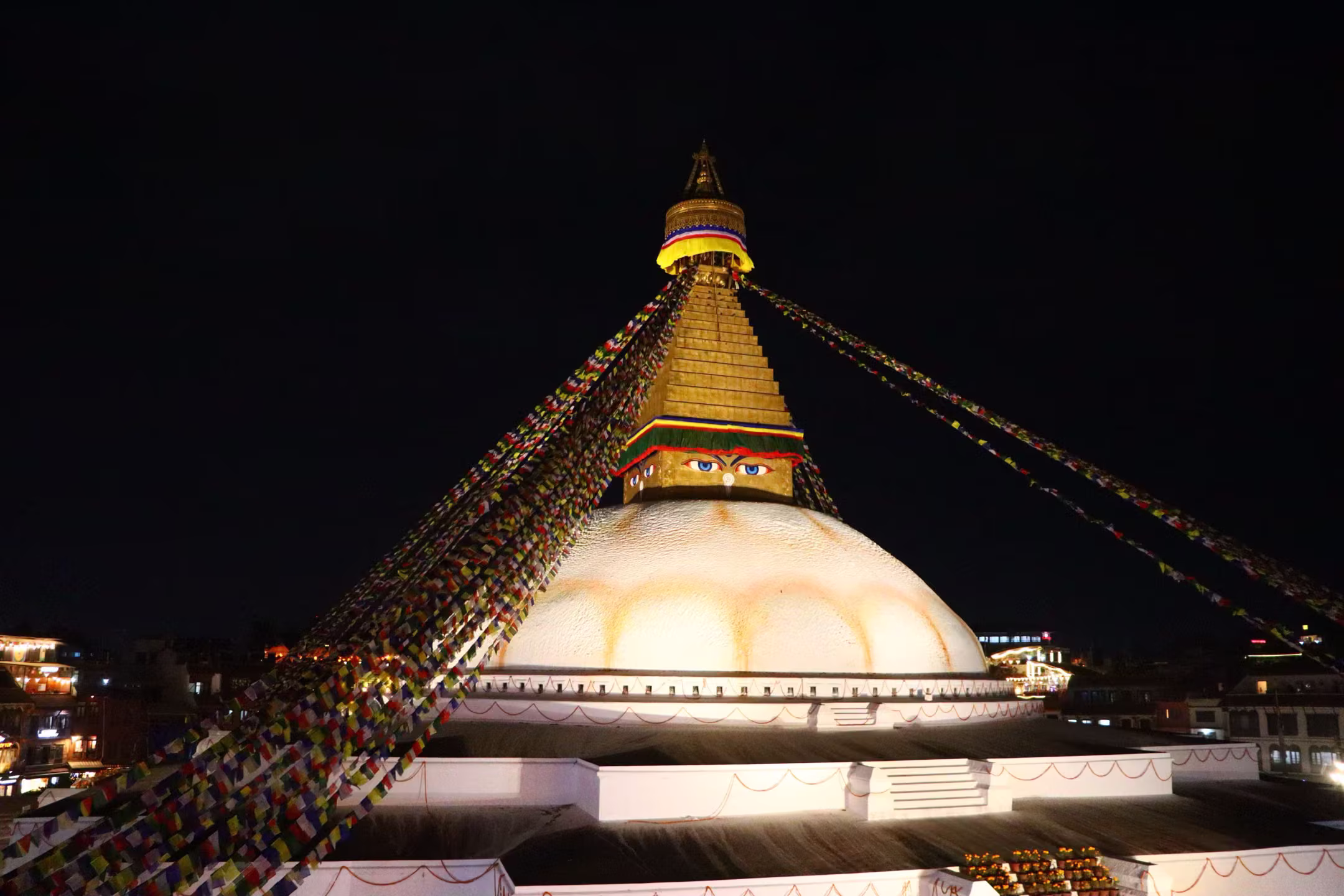 Boudhanath stupa illuminated at night
